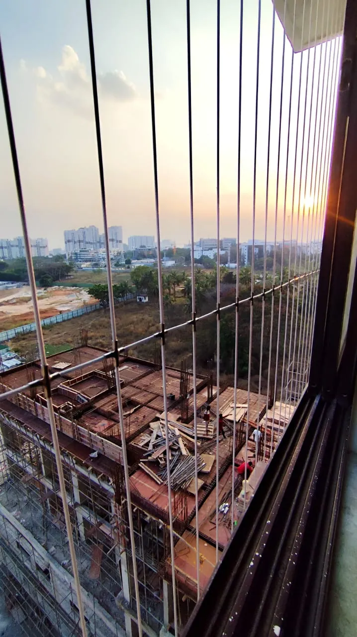 Premium balcony invisible grill with open skyline view